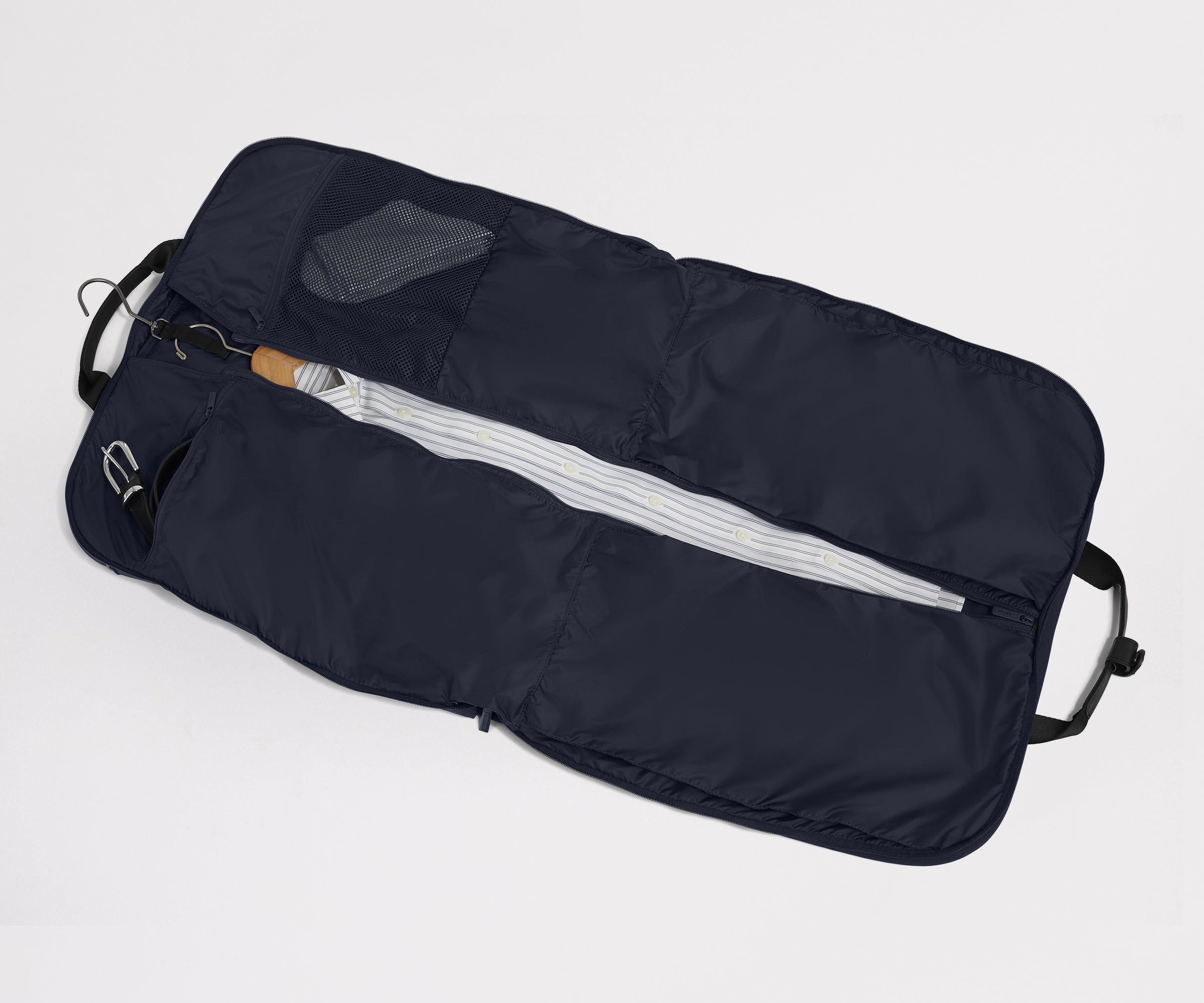 Garment Bag in Navy Blue fully unzipped and packed to show capacity and features