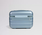 Blue travel case on a light gray background