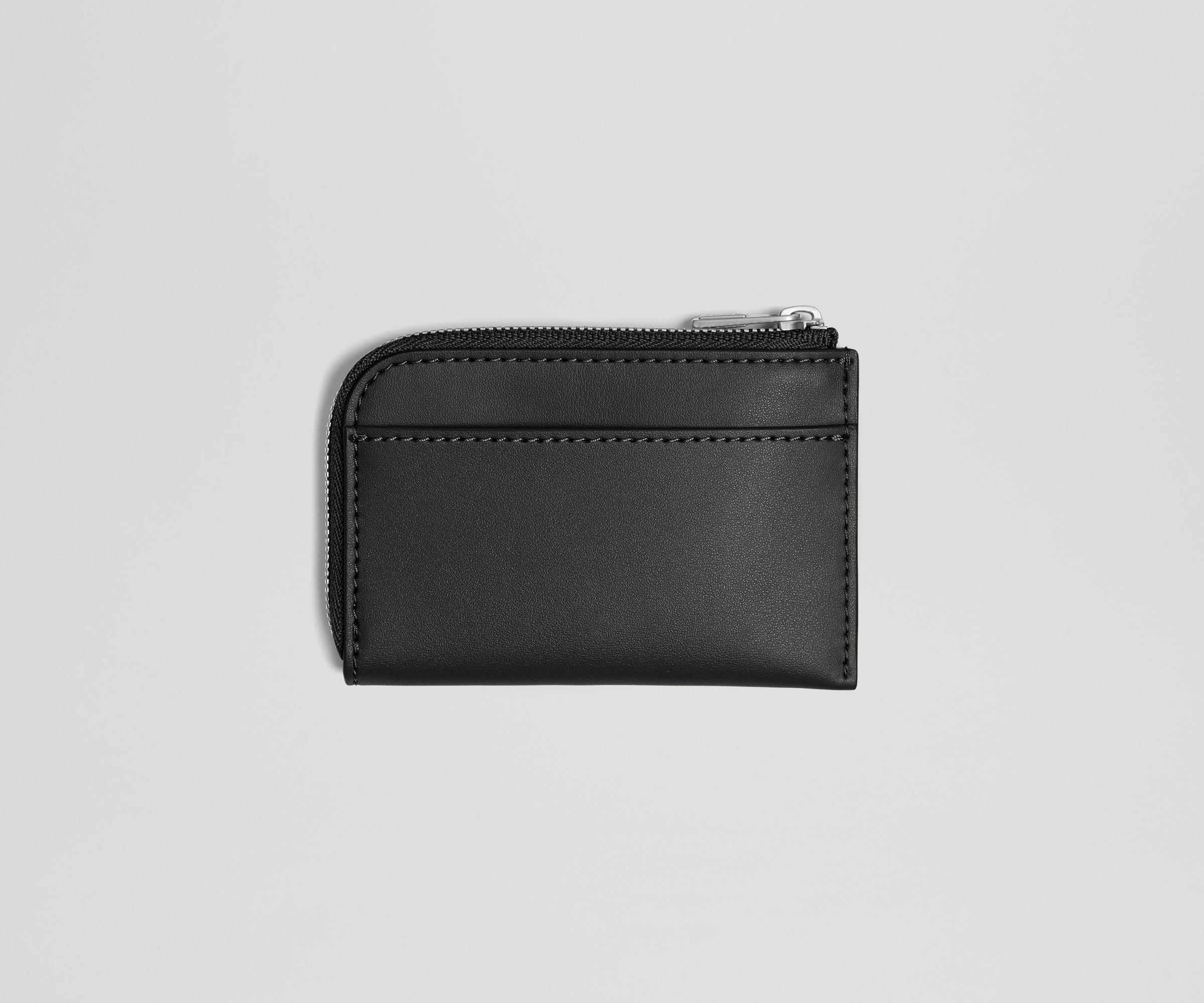 Black leather wallet with a zipper on a light gray background