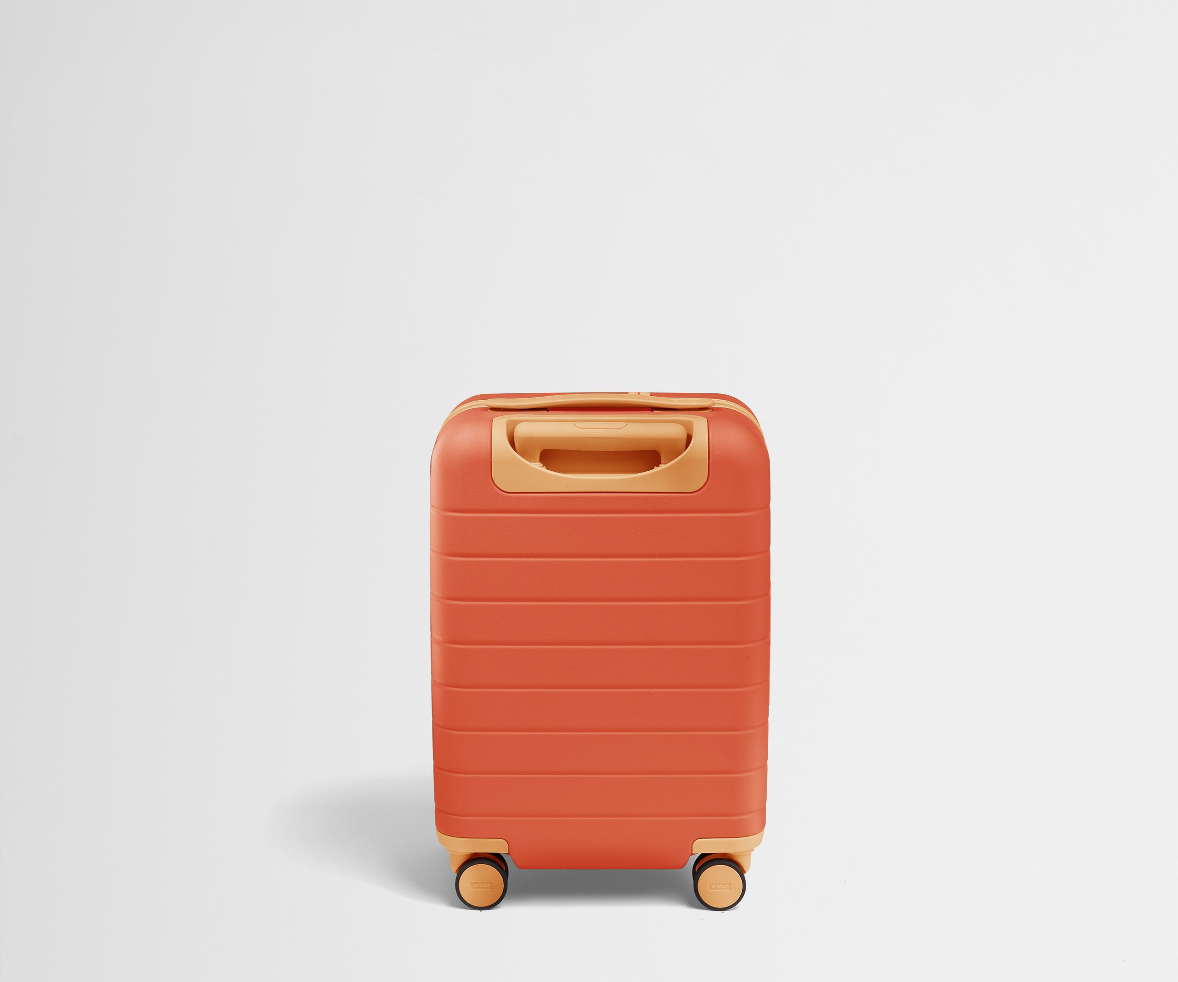 Back product view of The Kids Carry-On suitcase in Poppy Orange with raised handle