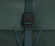 Detailed view of the fabric and buckle strap closure