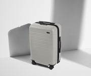 Angled product view of The Carry-On suitcase in Cloud Gray