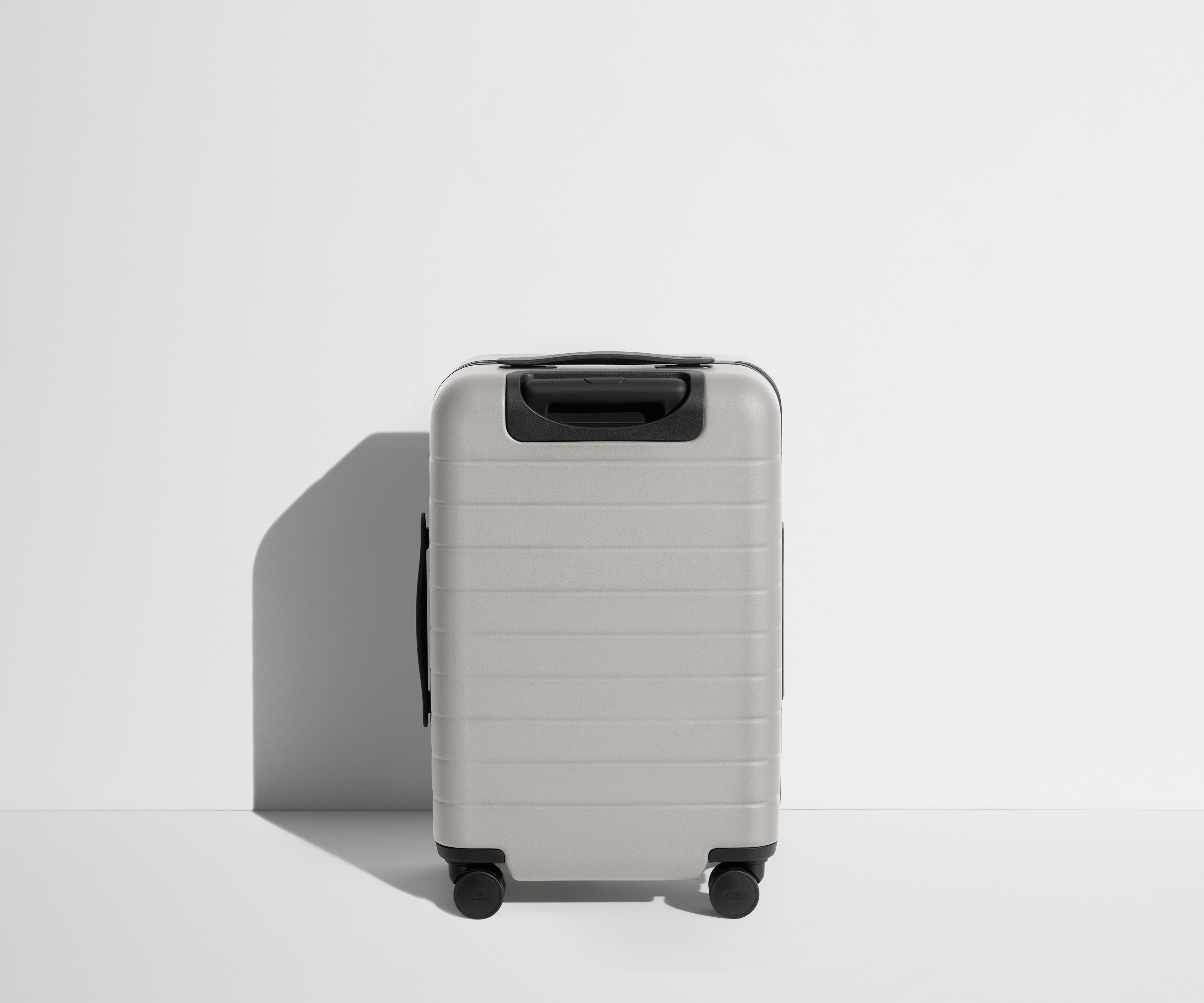 Back product view of The Carry-On suitcase in Cloud Gray