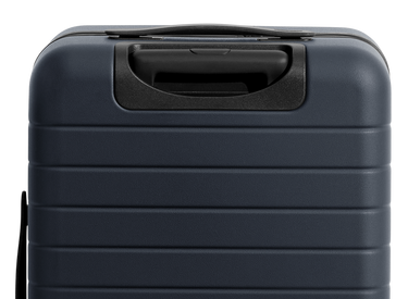 The Bigger Carry-On Flex in Navy Blue