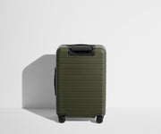 Back product view of The Bigger Carry-On Flex suitcase in Olive Green
