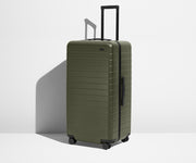 Angled product view of The Trunk suitcase in Olive Green