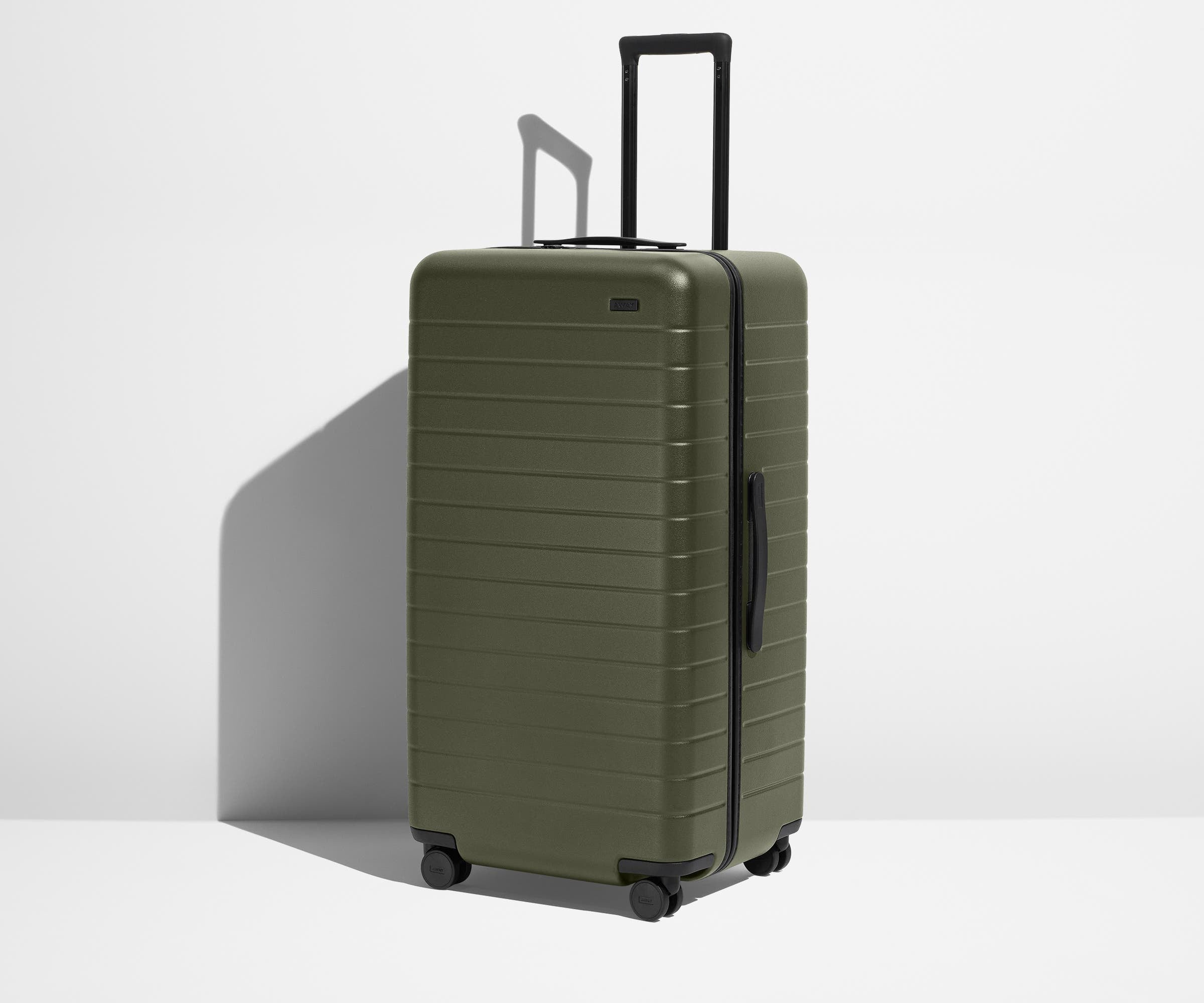 Angled product view of The Trunk suitcase in Olive Green