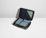 Four Insider Packing Cubes shown inside The Bigger Carry-On