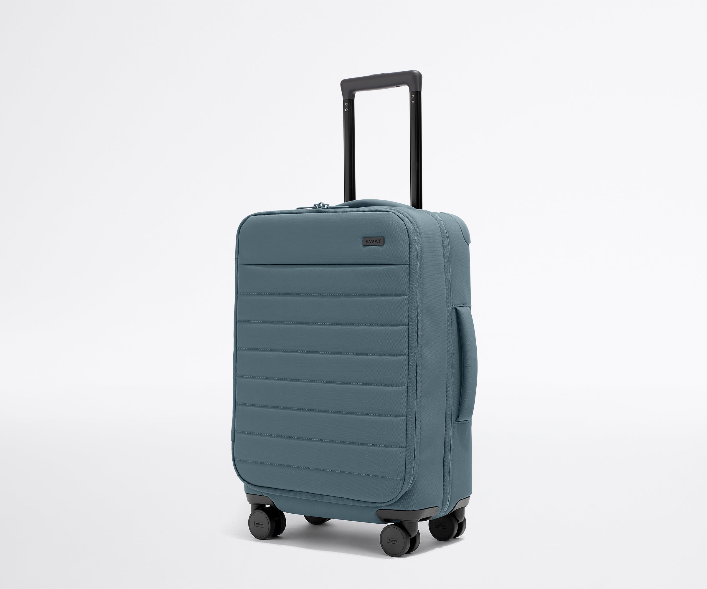 Angled view of the Softside Carry-On in Coast Blue