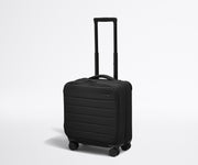 Angled product view of The Softside Compact Carry-On suitcase in Jet Black with raised handle