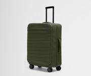 Angled product view of The Softside Medium suitcase in Olive Green with raised handle