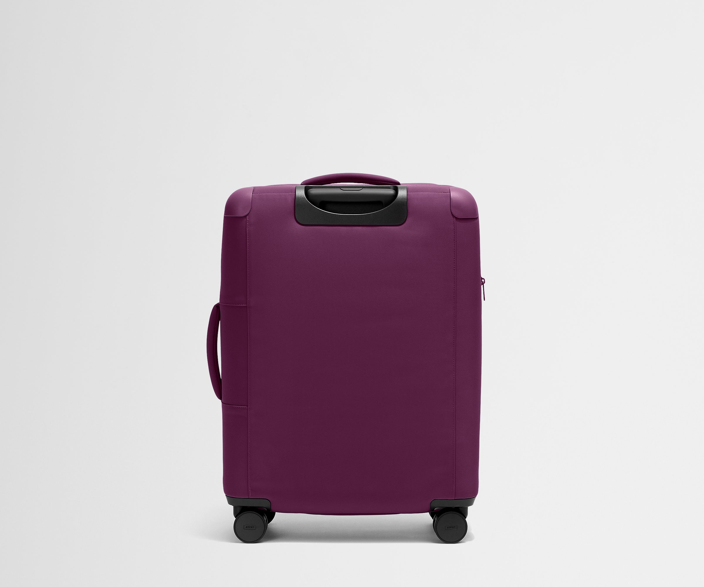 Back product view of The Softside Medium suitcase in Plum Purple