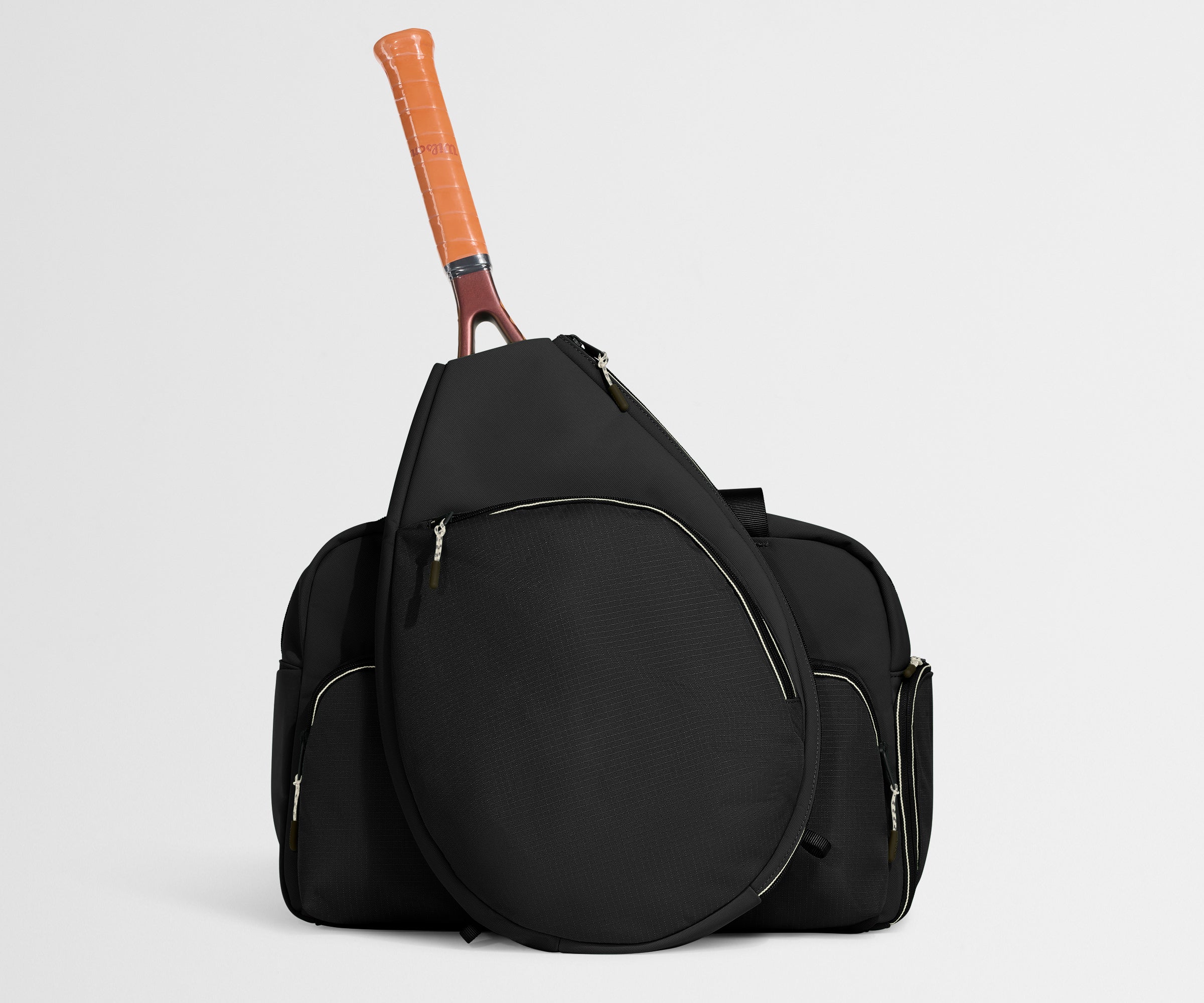 //
The Racket Bag seamlessly attaches with a magnetic back sleeve.