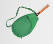Green bag with a paddle on a light gray background