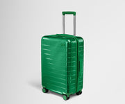 Angled product view of The Bigger Carry-On suitcase in Translucent Green