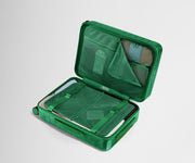 The Bigger Carry-On suitcase in Translucent Green shown open on its side and packed with Away's packing organizers to show capacity and the interior compression system, designed to help you pack more in
