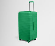 Angled product view of The Trunk suitcase in Palm Green