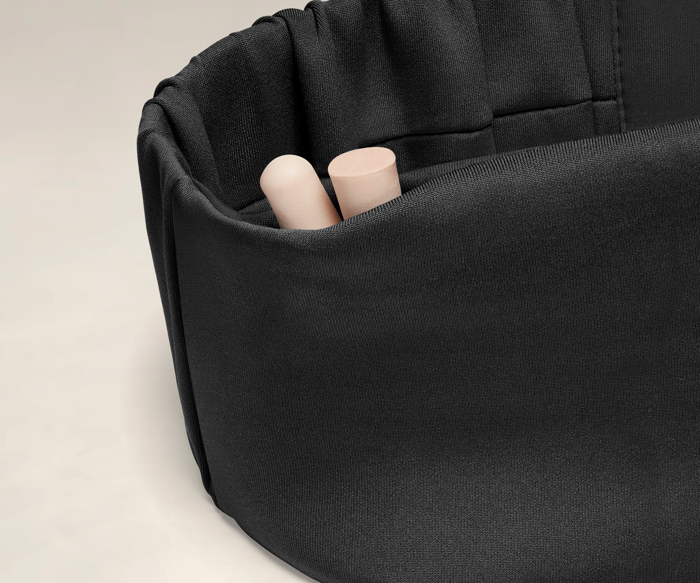 Discreet pocket with ear plugs