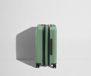 Side product view of The Carry-On Flex suitcase in Sea Green shown fully expanded