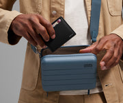 Card case being packed inside The Mini Crossbody