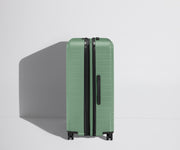 Side product view of The Large Flex suitcase shown fully expanded