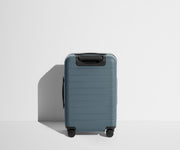 Back product view of The Carry-On suitcase in Coast Blue