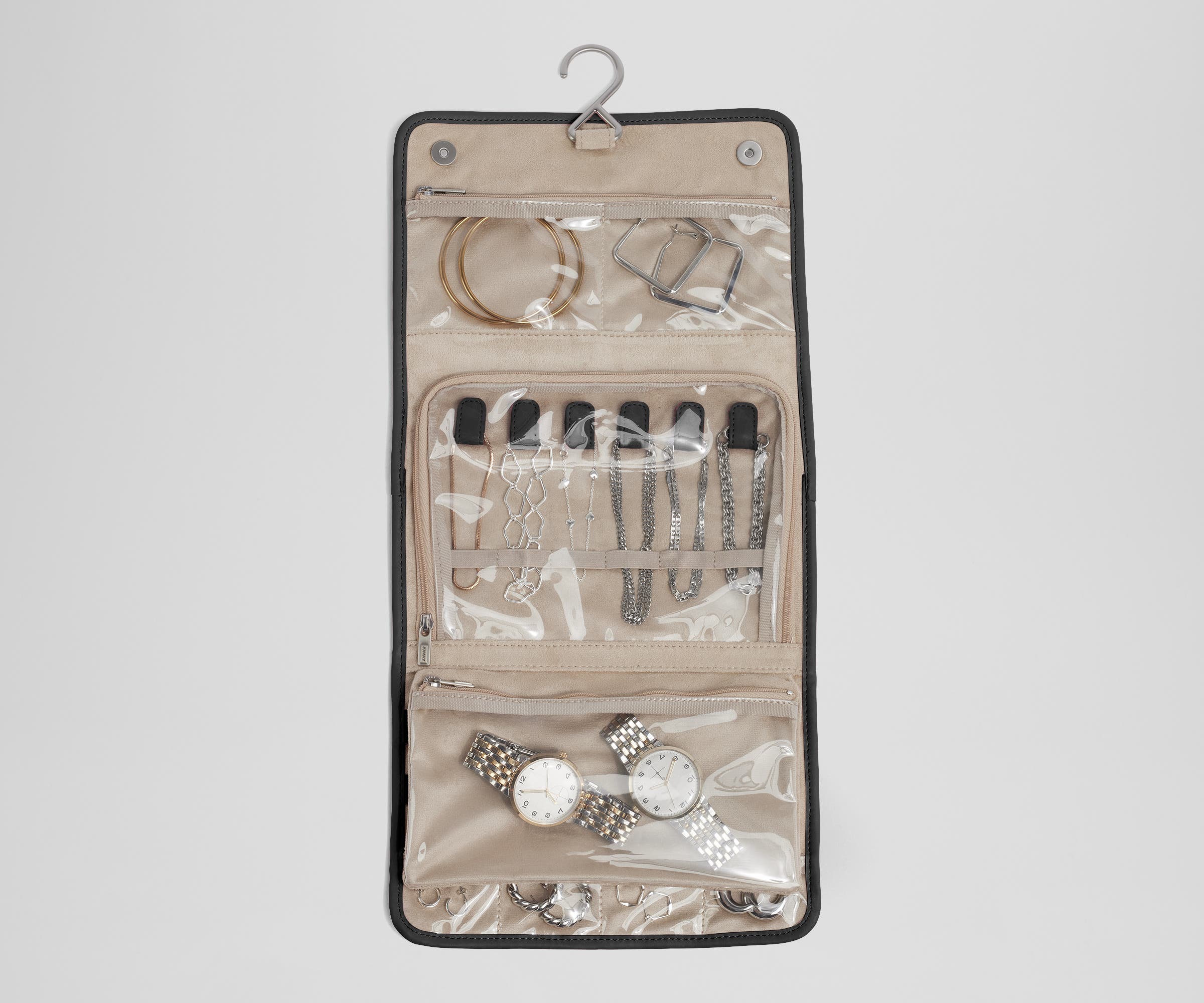 Unfolded Hanging Jewelry Oragnizer packed with jewelry and shown with the hook for easy hanging