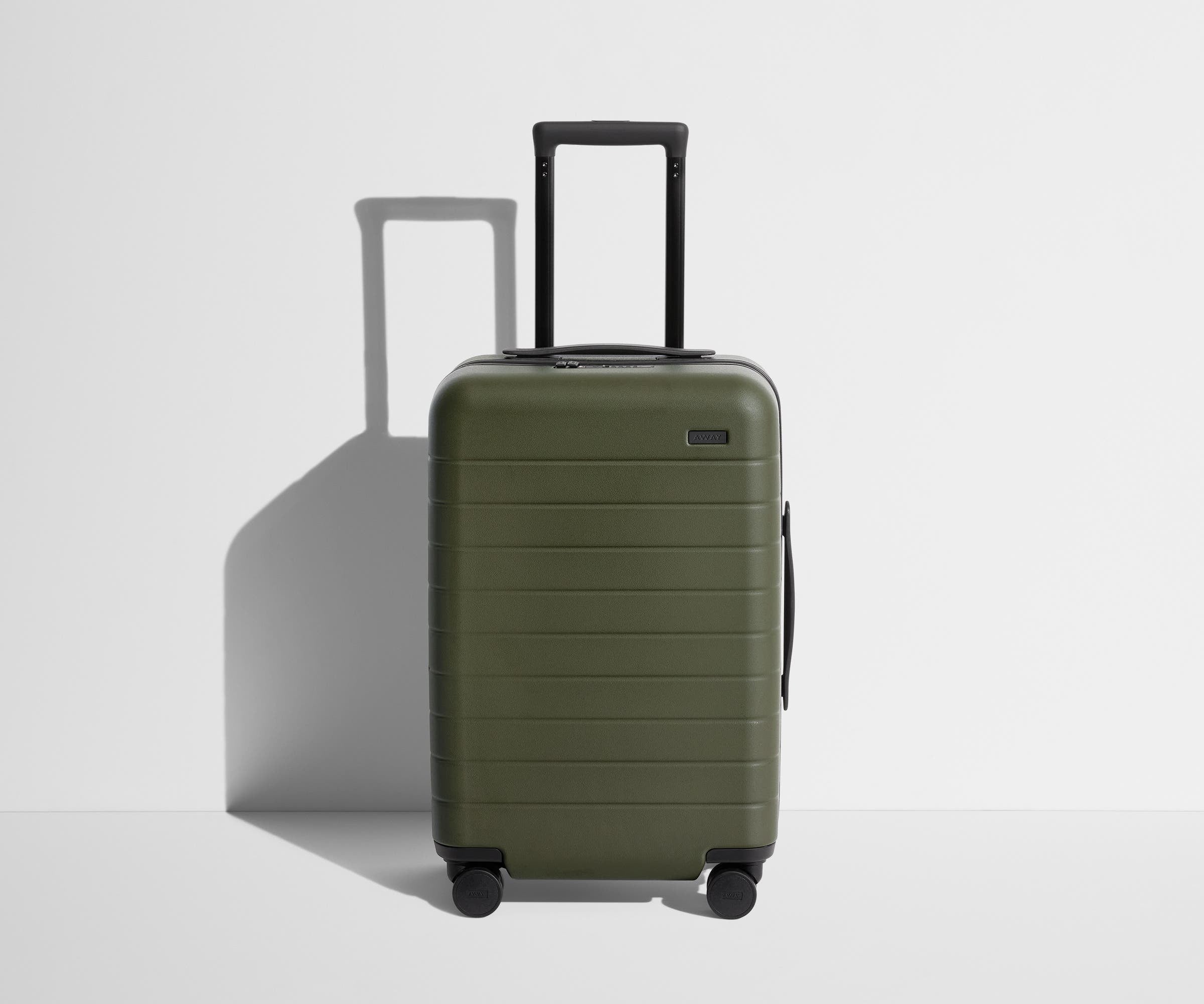 Front product view of The Carry-On suitcase in Olive Green with raised handle