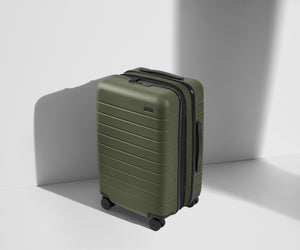 Angled product view of The Carry-On Flex suitcase in Olive Green