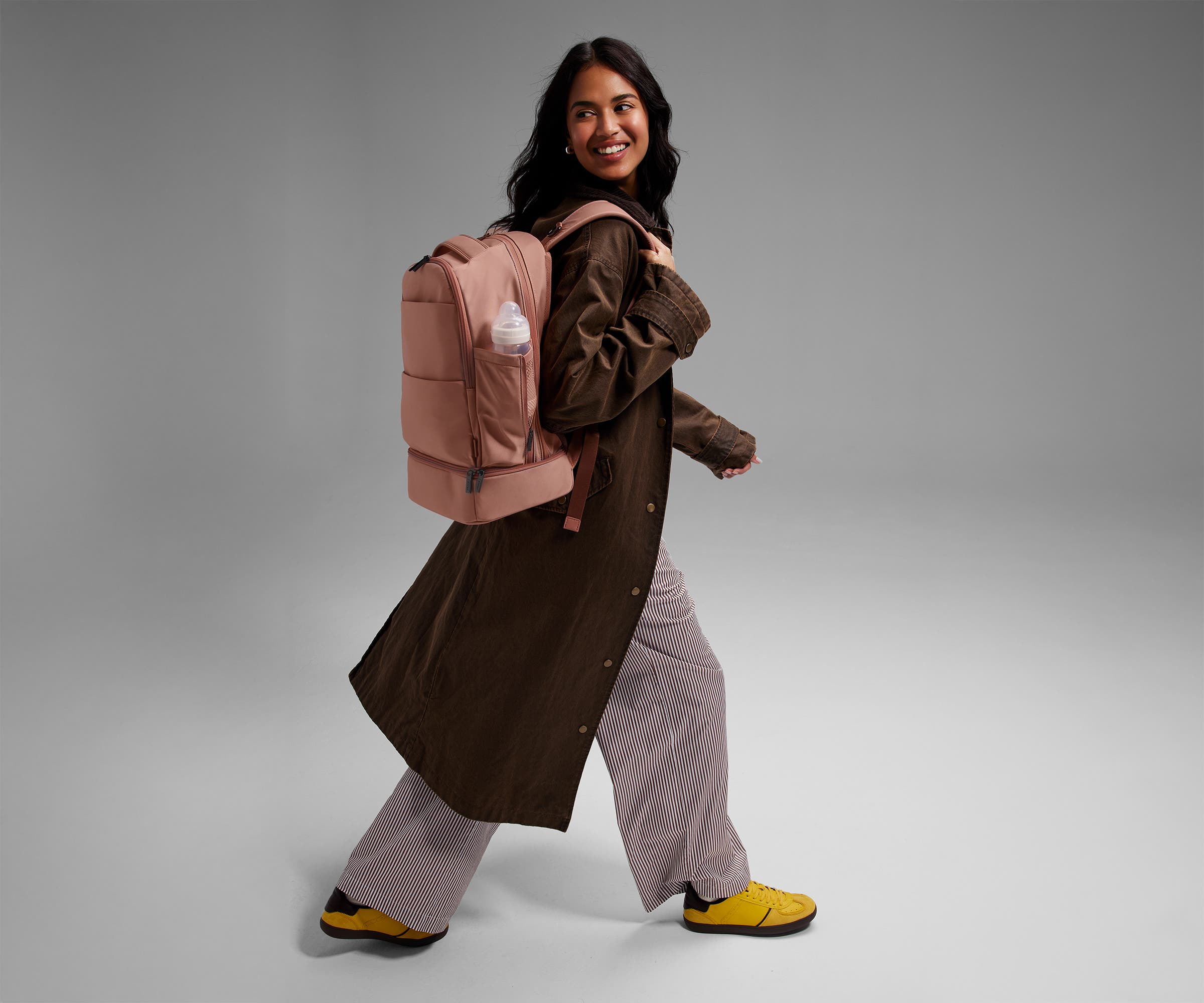 Person wearing the Double Diaper Backpack