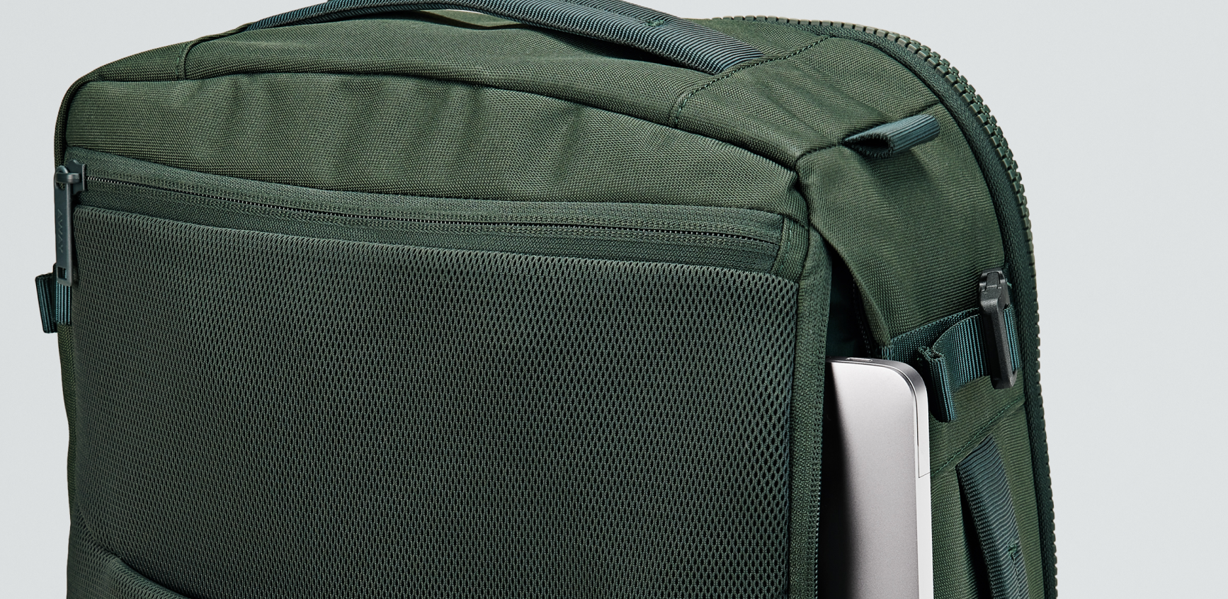 An Away Active convertible backpack close crop of the laptop sleeve