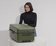 Video of a person packing a Trunk checked suitcase