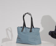 Video of a person packing the Everywhere Tote bag